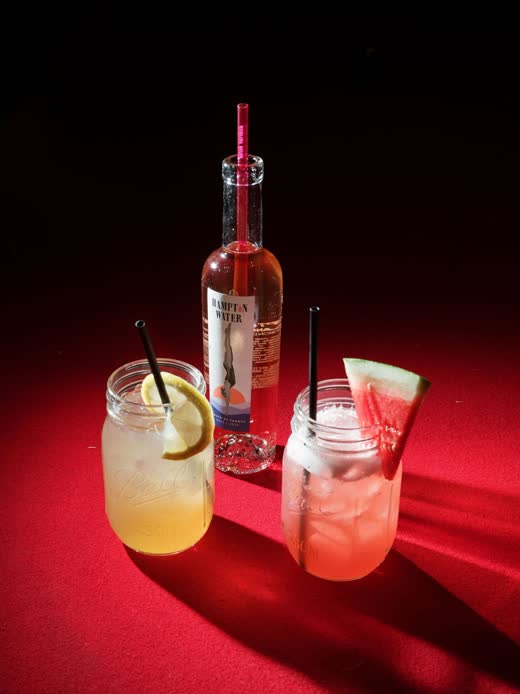 A cocktail glowing under red light